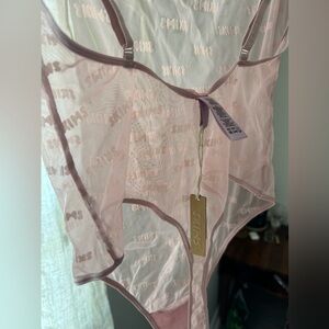 Ultra flattering SKIMS After Hours Mesh Cami in Orchid